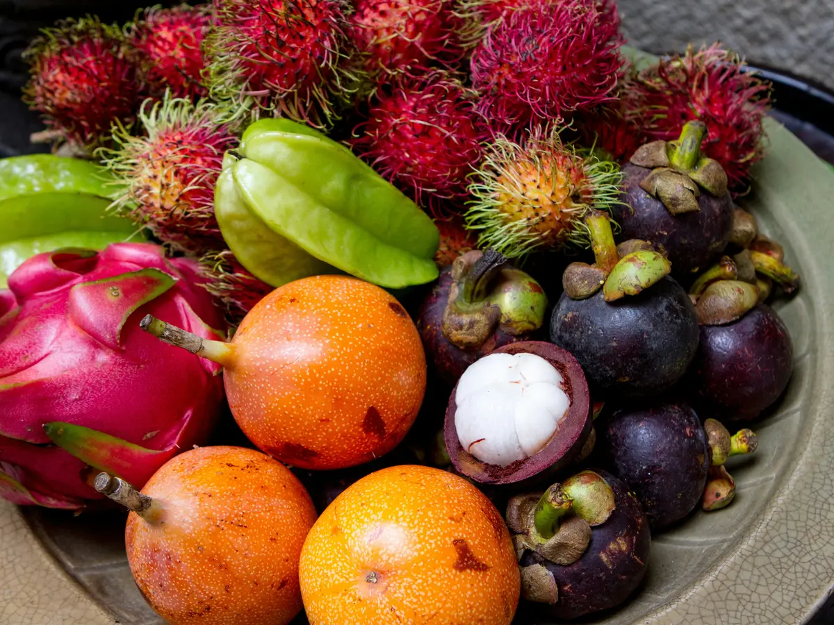 Fresh tropical fruit, including mango and dragon fruit